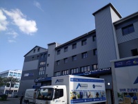 Lerchenau - Wellfassade RAL 9007