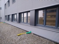 Lerchenau - Wellfassade RAL 9007