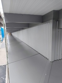 Wellfassade / Binderverkleidung / untere Verkleidung